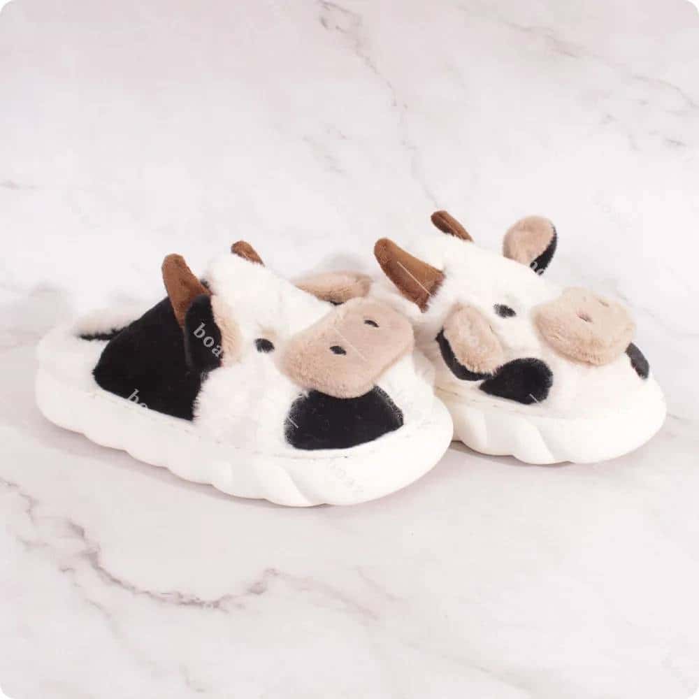 Pantufla vaca negra